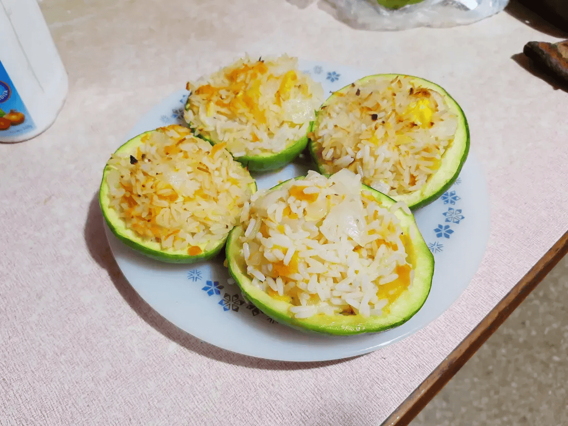 Baked Rice and Cheese Stuffed Courgettes
